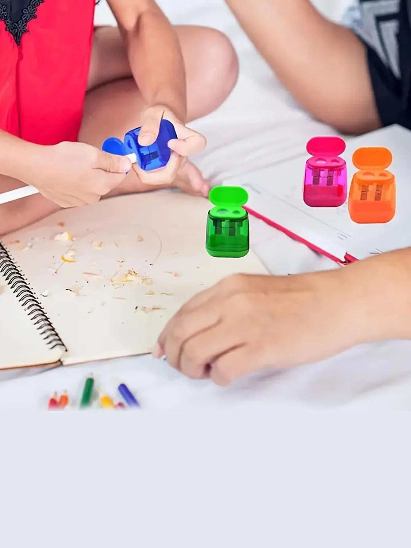 A color random student two-hole pencil sharpener for children's school supplies - a must-have for starting school